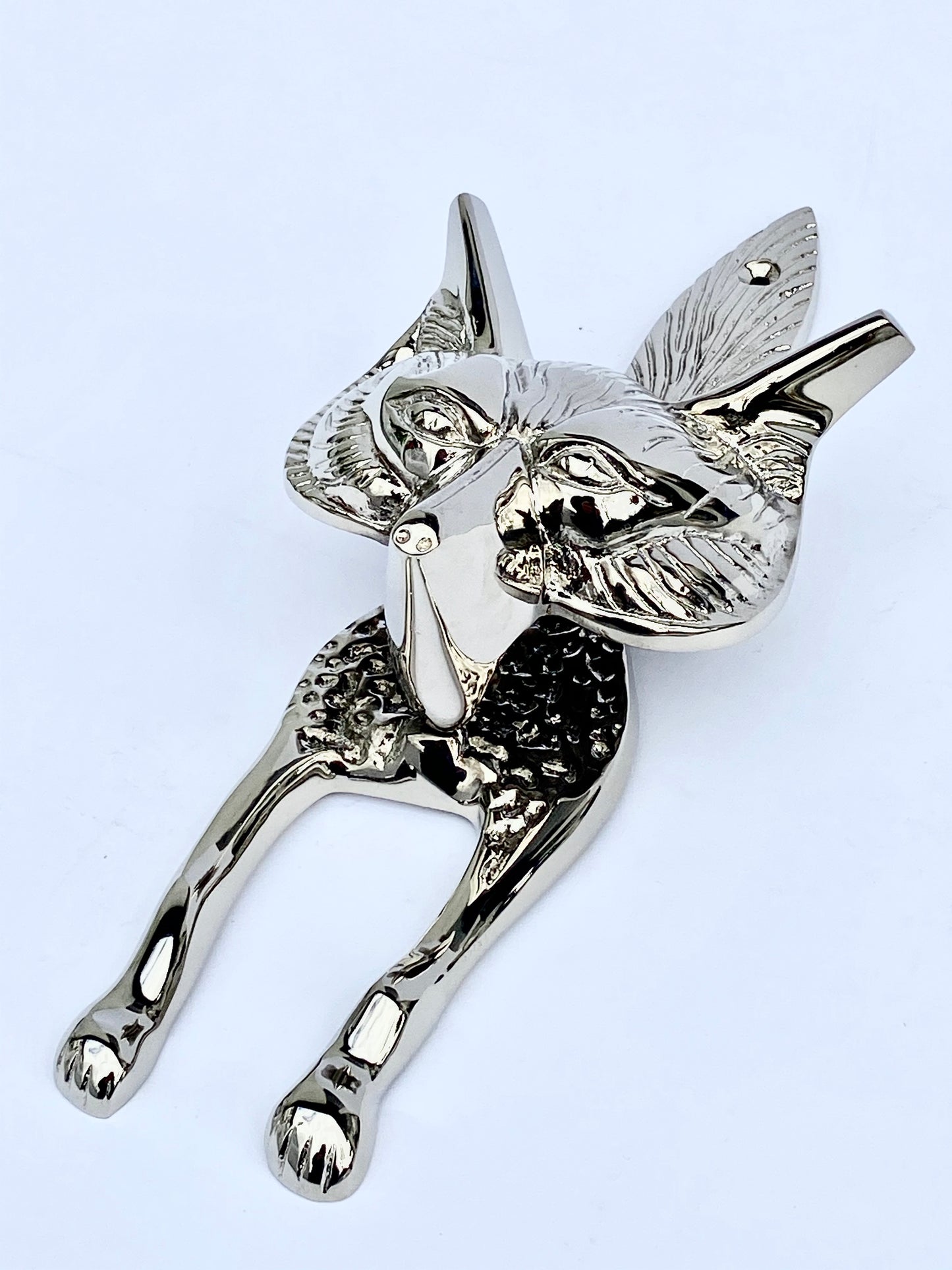 Detailed antique-style fox head door knocker in iron, unique wildlife-themed hardware for traditional wooden doors